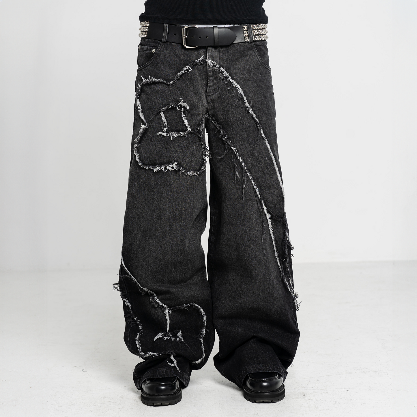 BLACK "INFINITY" RAW JEANS