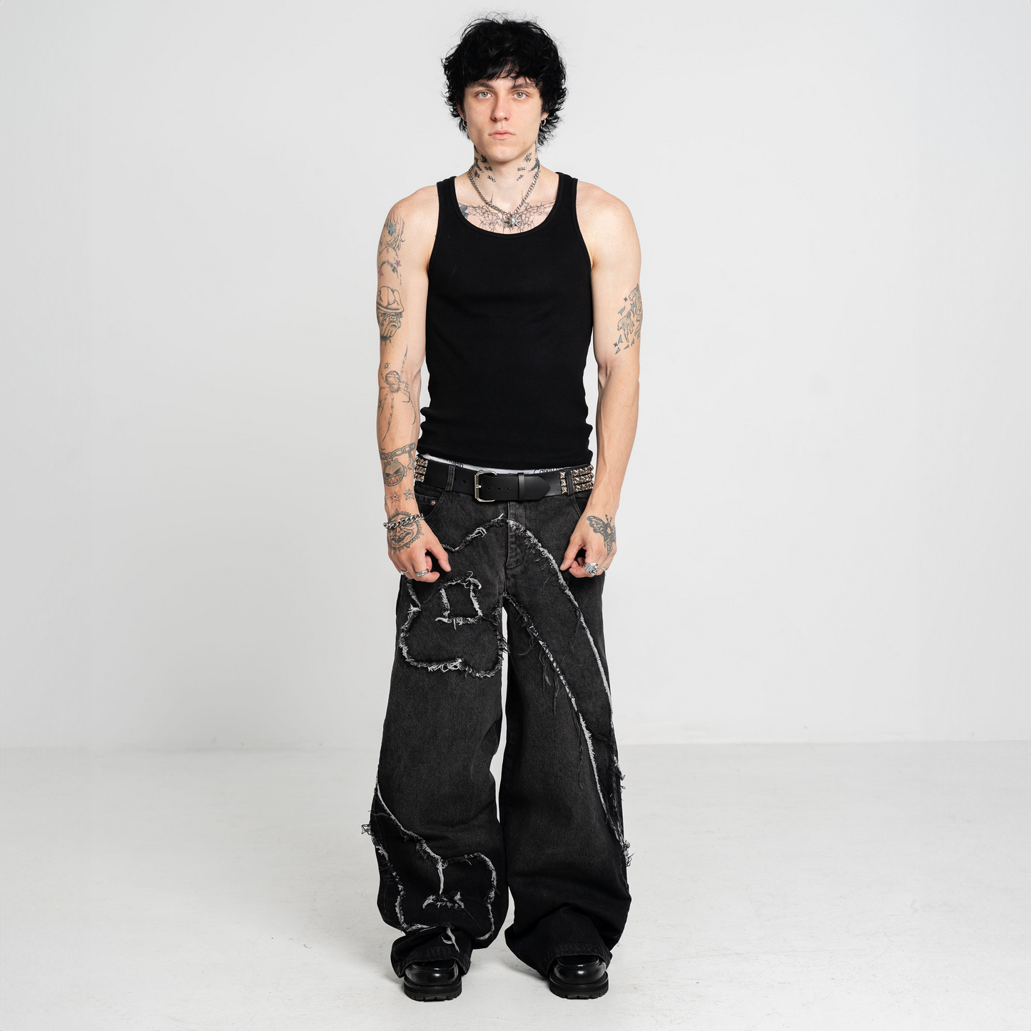 BLACK "INFINITY" RAW JEANS